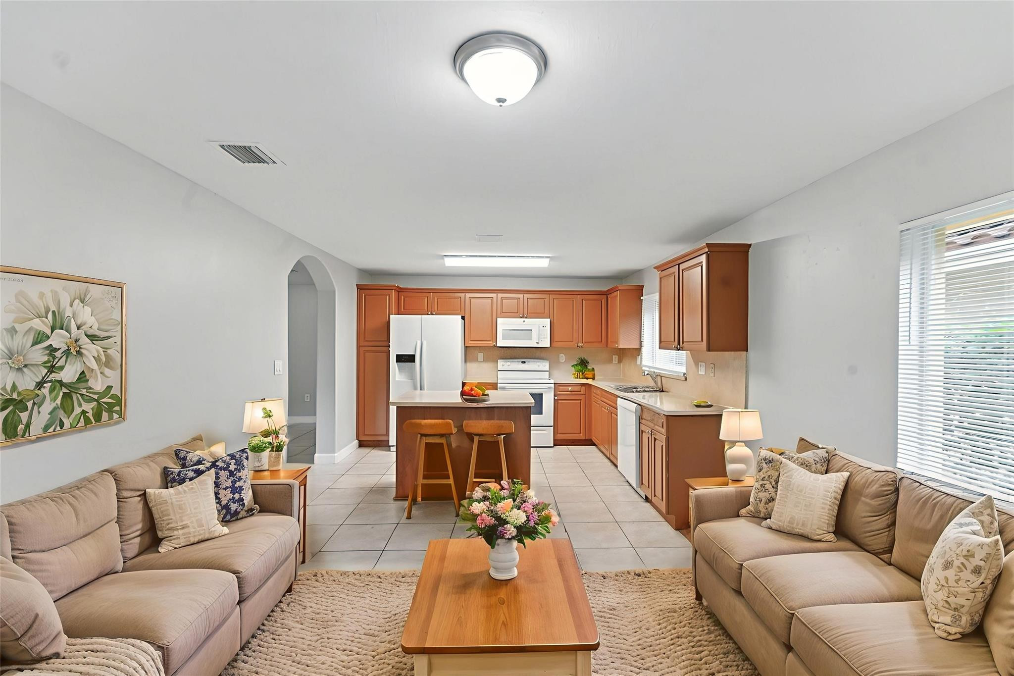 25355 Southwest 135th Court Homestead, FL 33032 - Photo 2 of 40 a living room with furniture and a large window