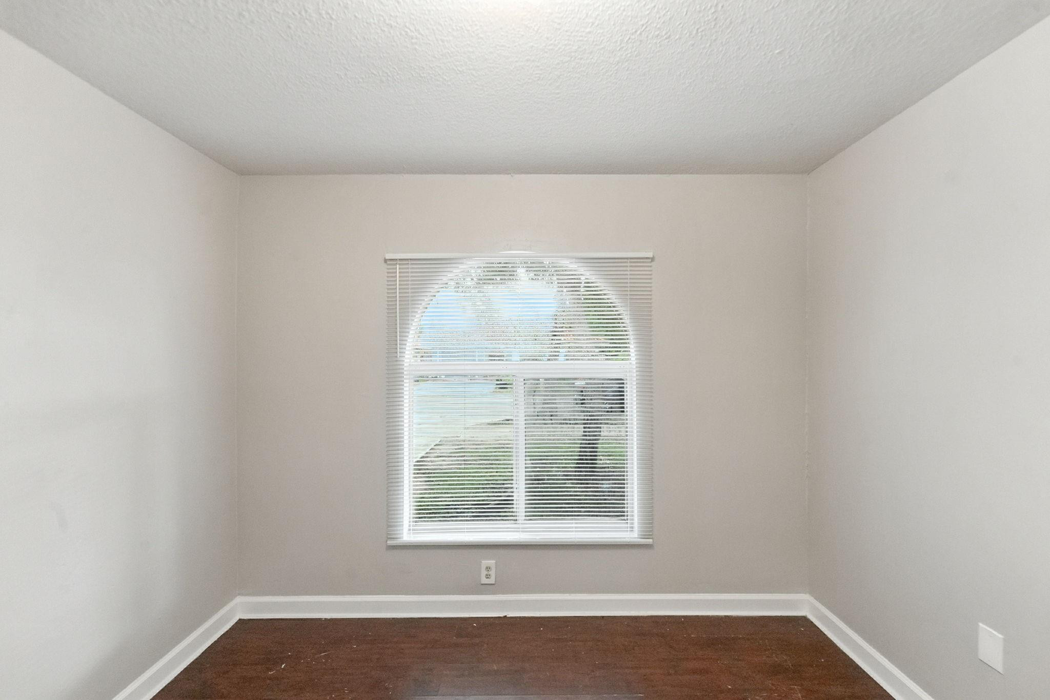 25355 Southwest 135th Court Homestead, FL 33032 - Photo 21 of 40 an empty room with a window