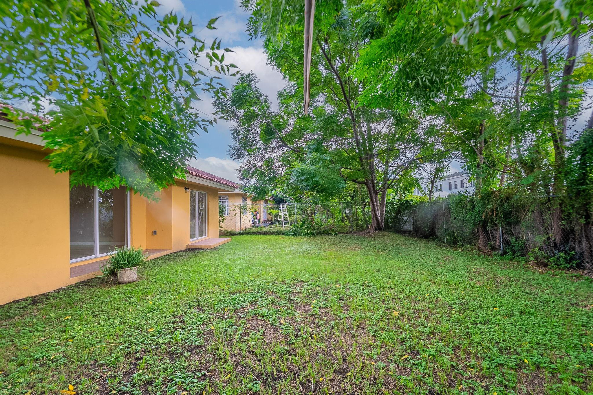 25355 Southwest 135th Court Homestead, FL 33032 - Photo 36 of 40 a view of a backyard of the house