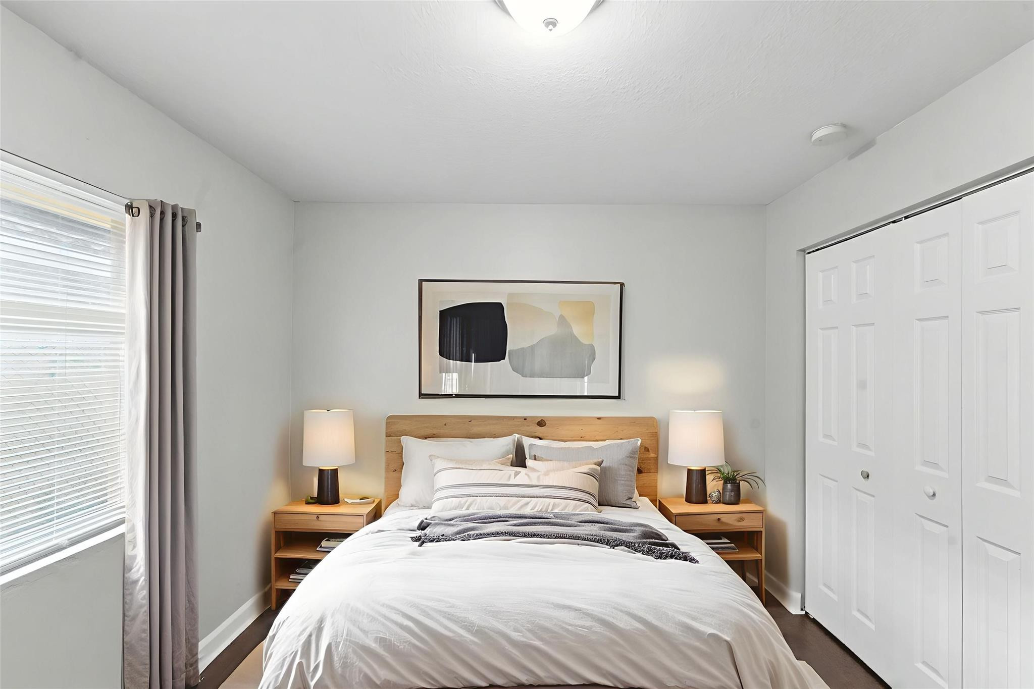 25355 Southwest 135th Court Homestead, FL 33032 - Photo 5 of 40 a bedroom with double bed and a window