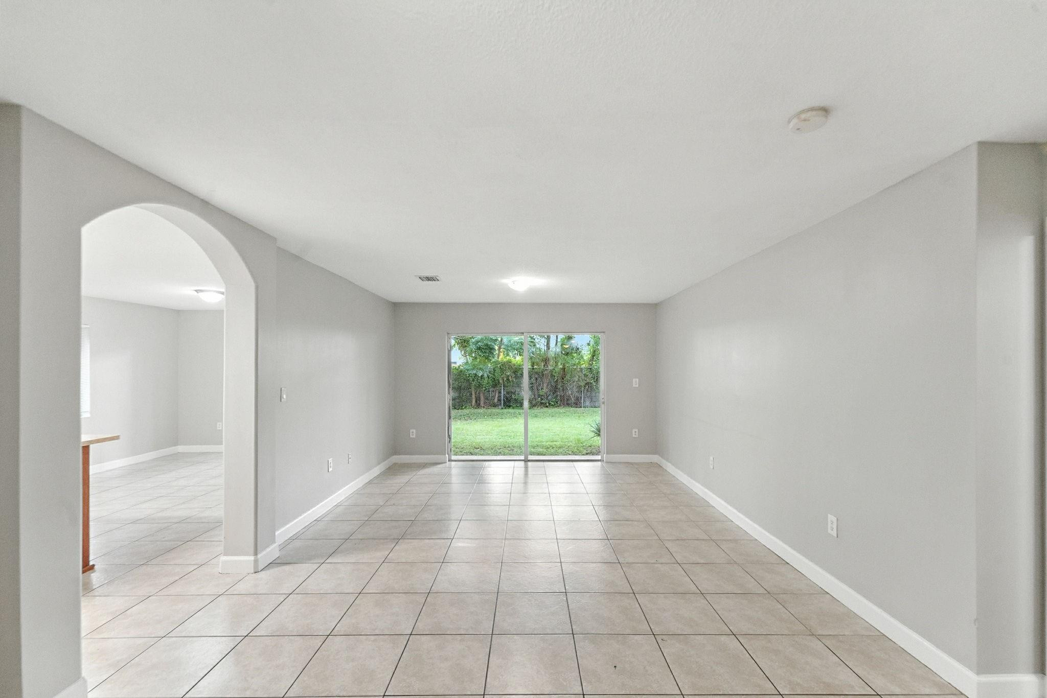 25355 Southwest 135th Court Homestead, FL 33032 - Photo 8 of 40 a view of an empty room and window