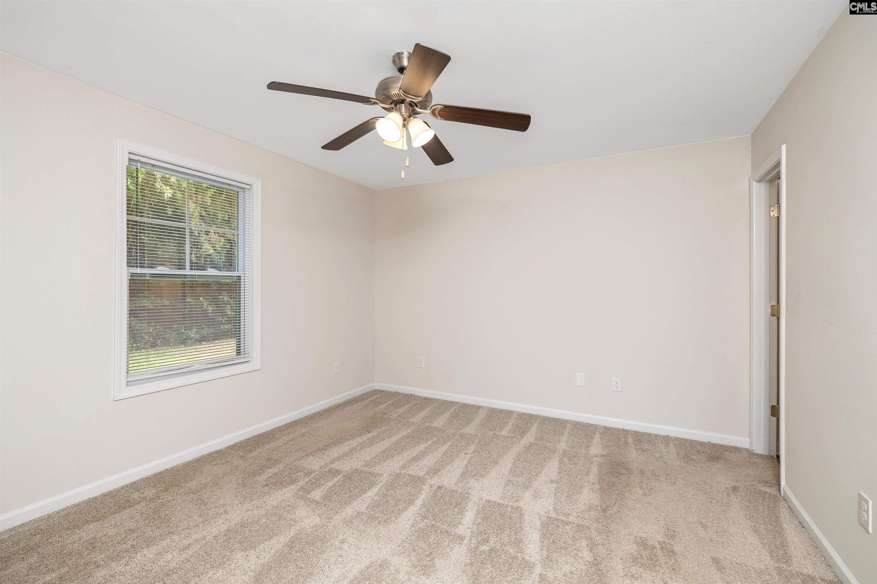 2157 Still Pointe Drive Sumter, SC 29154 - Photo 19 of 25 an empty room with windows and fan