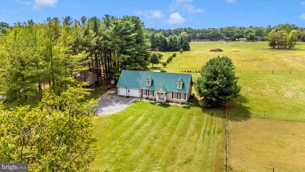 a view of a yard with an outdoor space