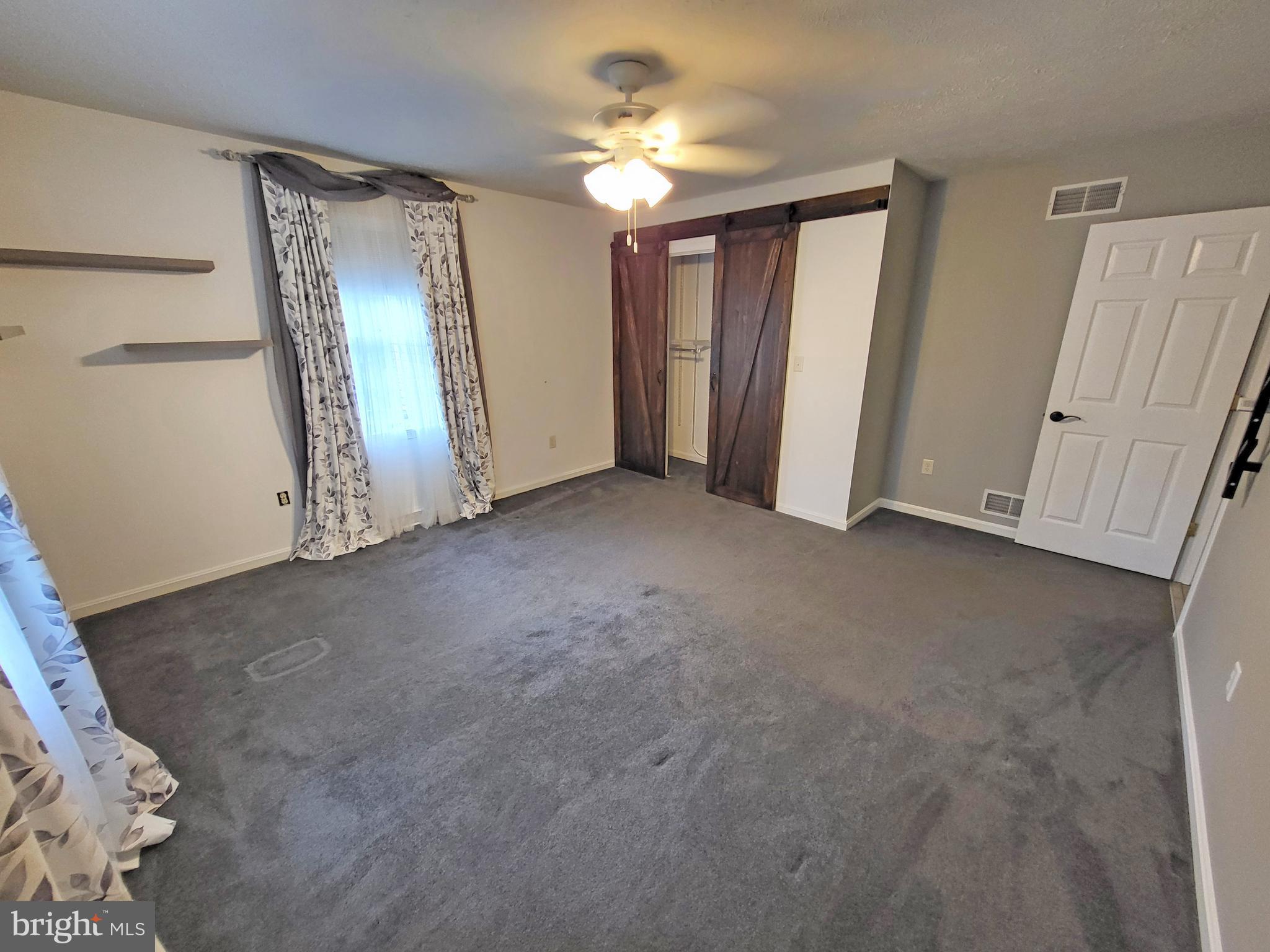 212 Walnut Dale Road Shippensburg, PA 17257 - Photo 25 of 56 a view of empty room with ceiling fan