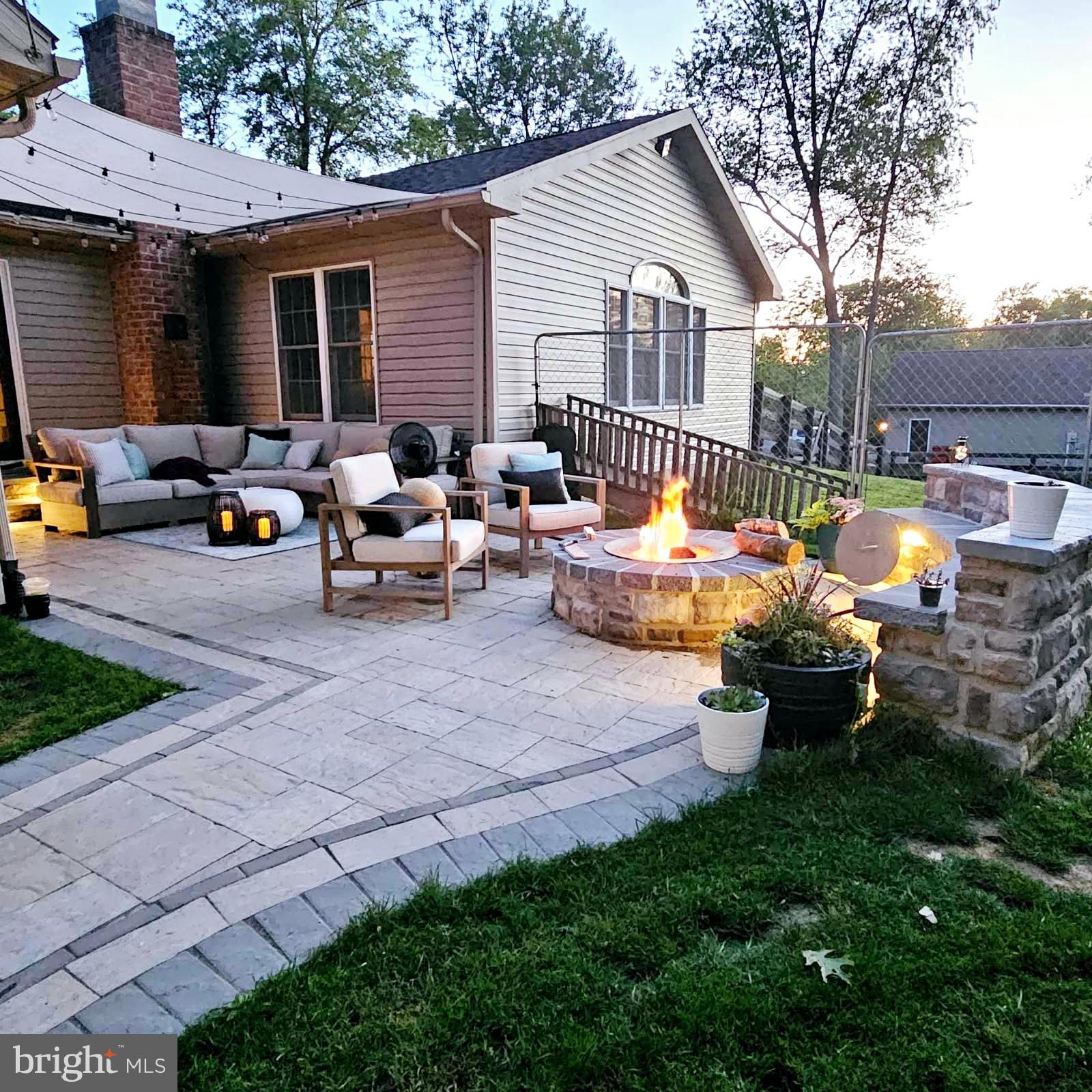 212 Walnut Dale Road Shippensburg, PA 17257 - Photo 34 of 56 a backyard of a house with table and chairs