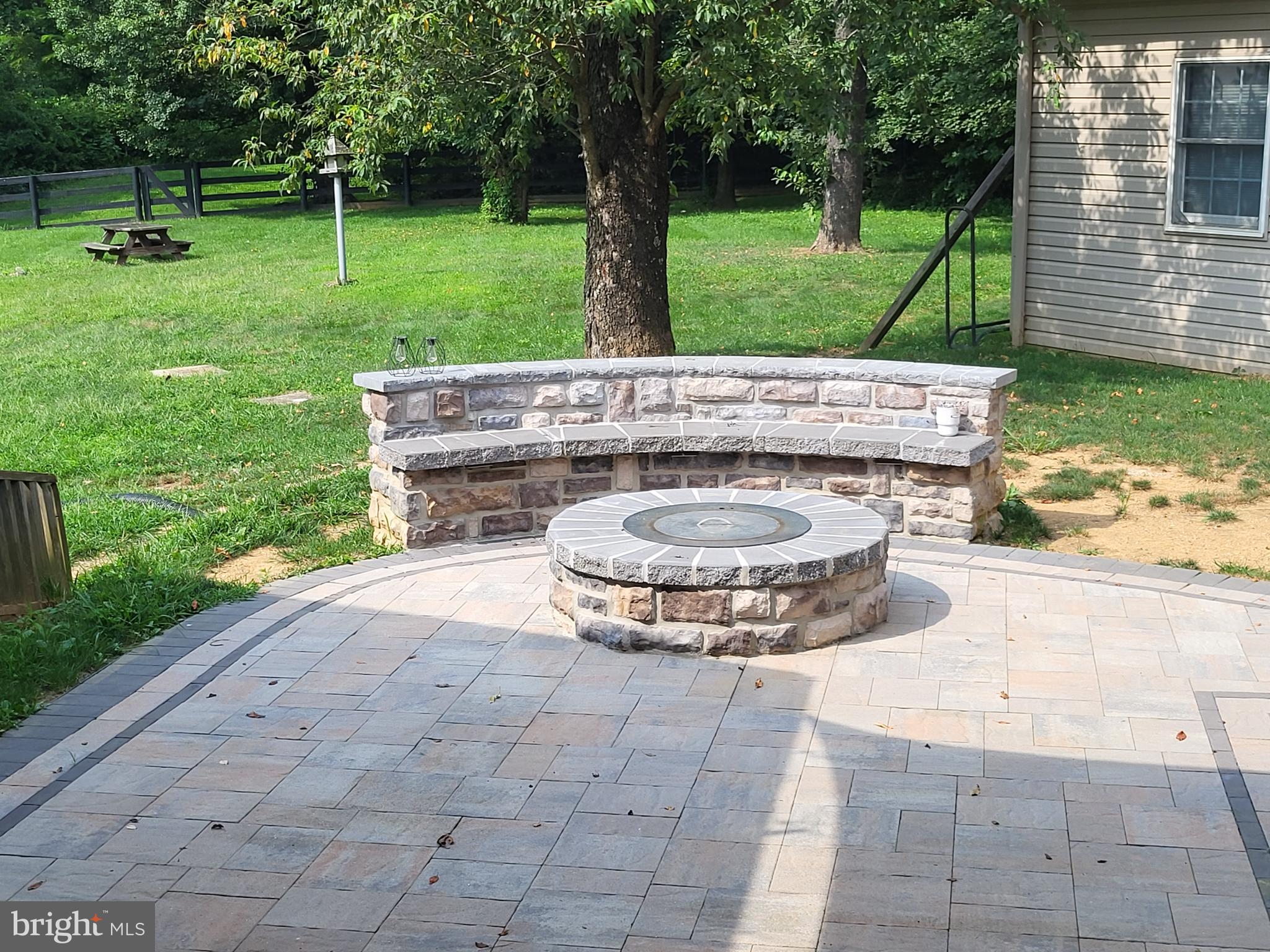 212 Walnut Dale Road Shippensburg, PA 17257 - Photo 37 of 56 a view of a backyard with a garden and entertaining space