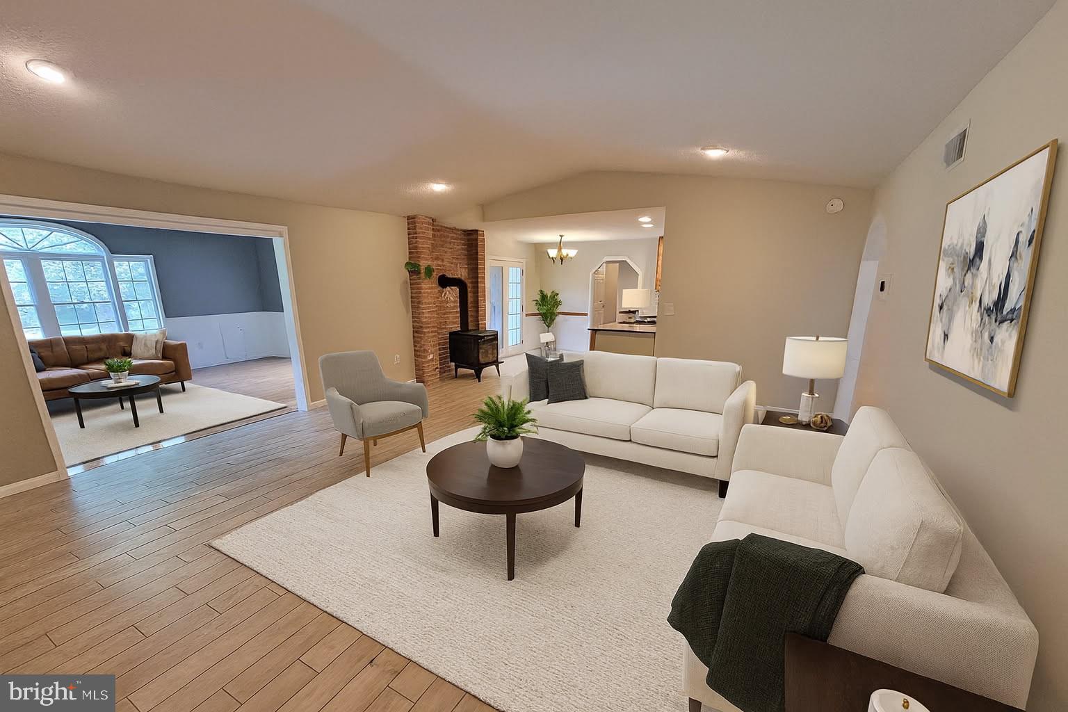 212 Walnut Dale Road Shippensburg, PA 17257 - Photo 4 of 56 a living room with furniture and a wooden floor