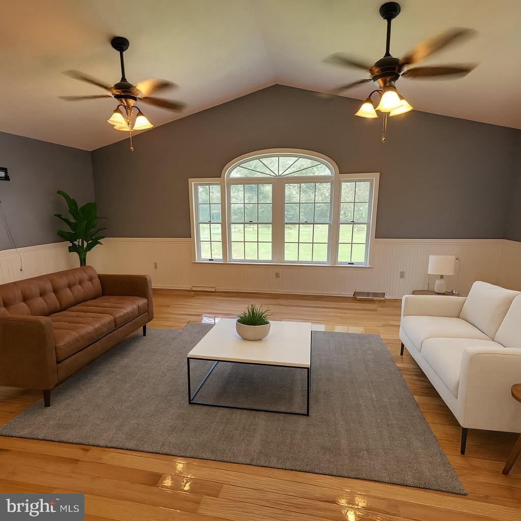 212 Walnut Dale Road Shippensburg, PA 17257 - Photo 6 of 56 a living room with furniture and a chandelier