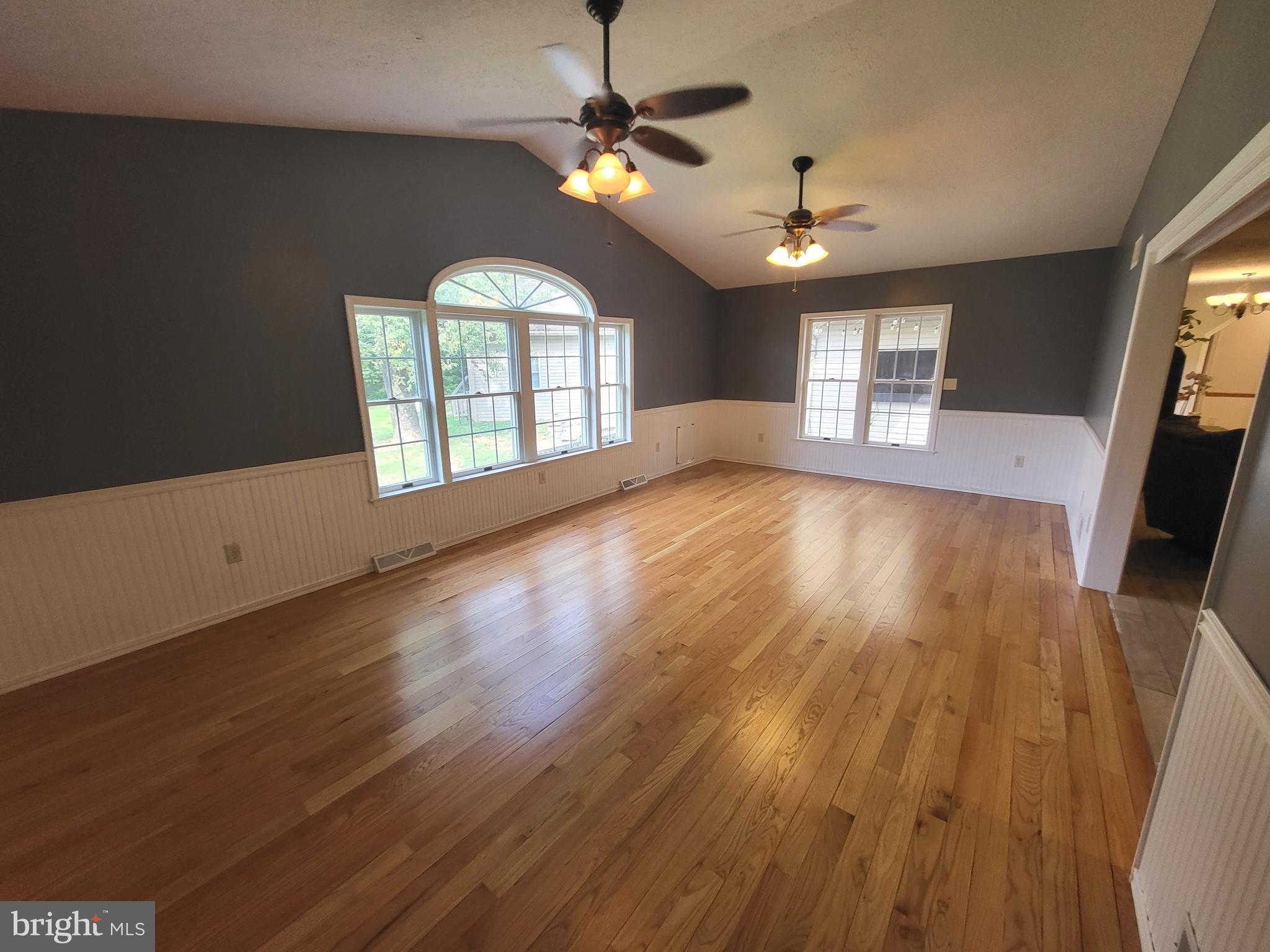 212 Walnut Dale Road Shippensburg, PA 17257 - Photo 7 of 56 wooden floor in an empty room with a window