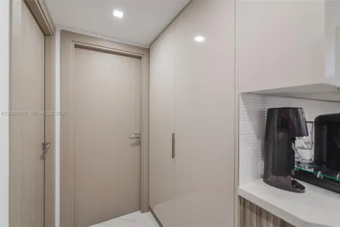 a bathroom with a sink toilet a mirror and shower