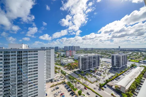 a view of a city with tall buildings