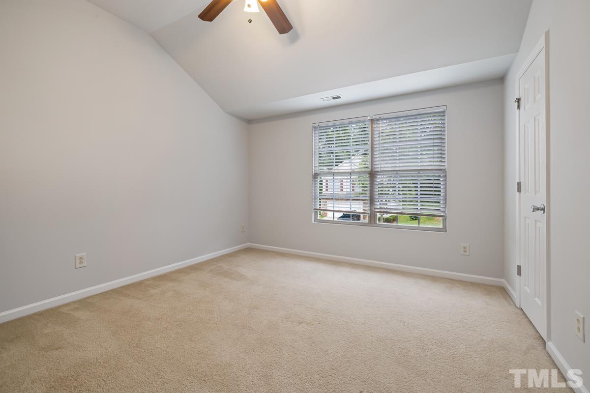 3739 Burtons Barn Street Raleigh, NC 27610 - Photo 23 of 42 an empty room with windows