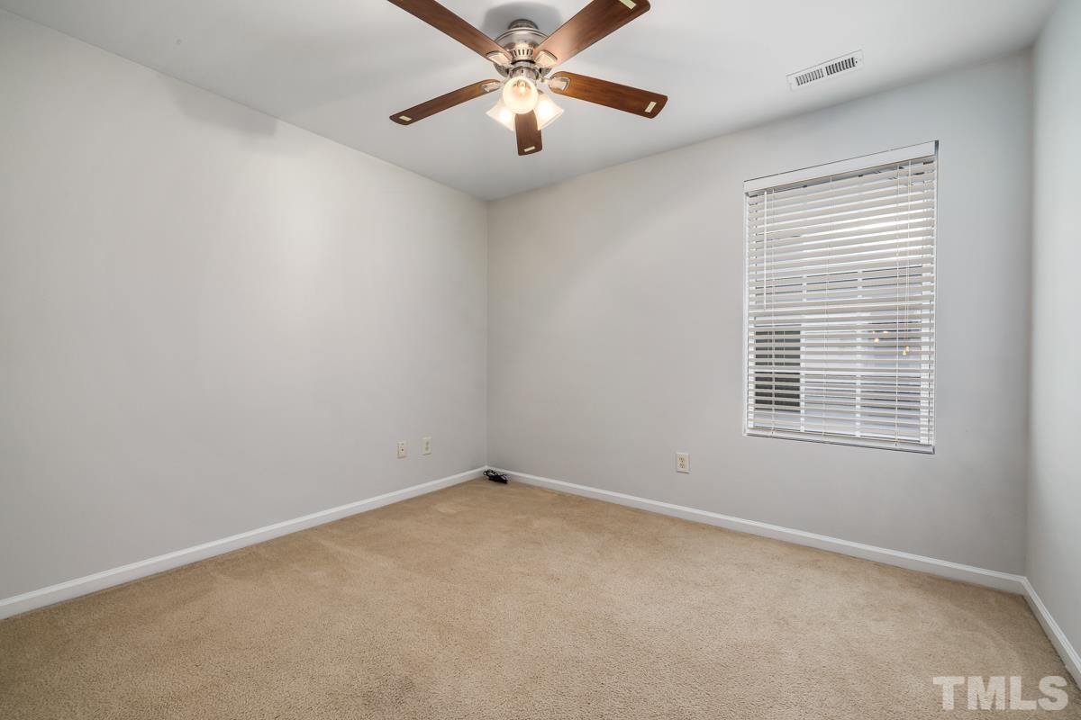 3739 Burtons Barn Street Raleigh, NC 27610 - Photo 25 of 42 a view of an empty room with a window