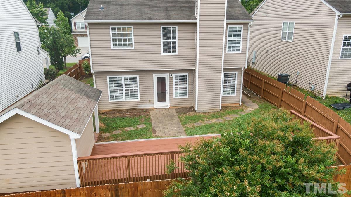3739 Burtons Barn Street Raleigh, NC 27610 - Photo 37 of 42 a view of a house with a yard