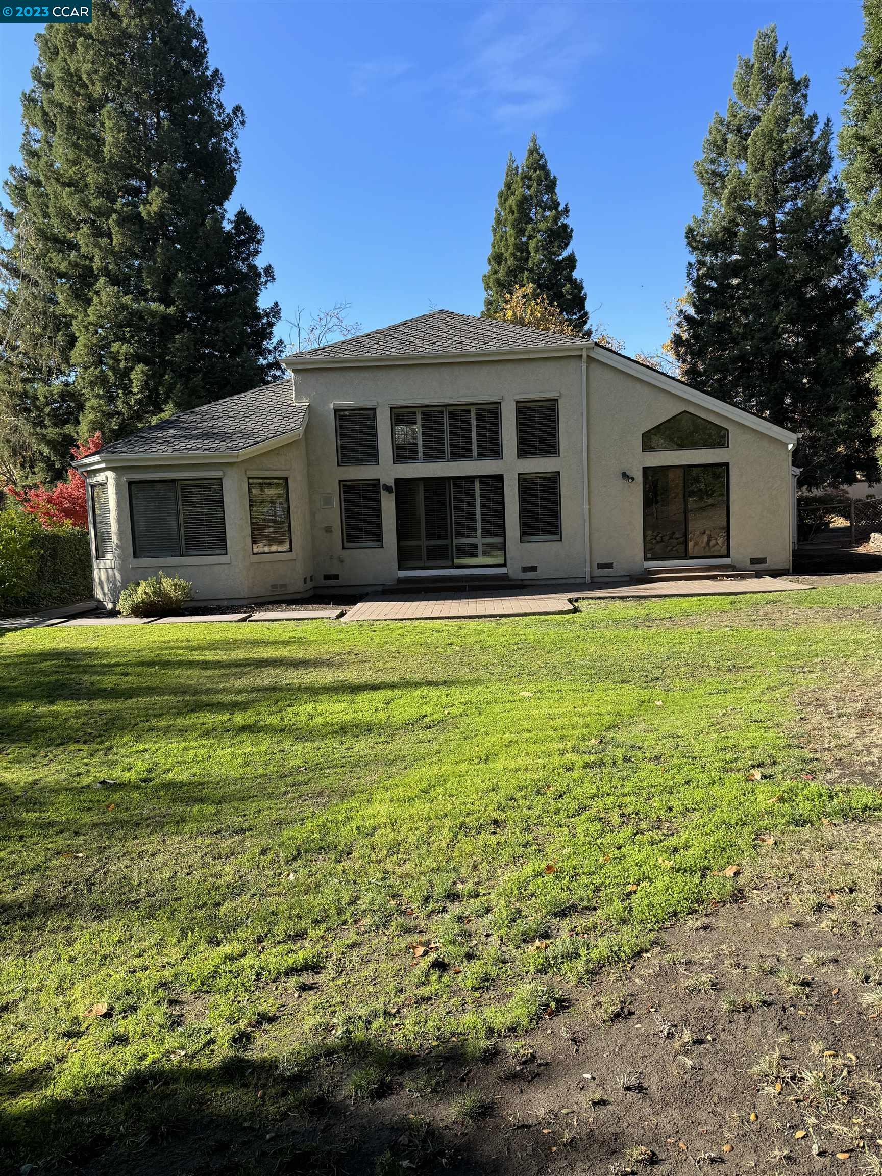 3089 Deer Meadow Drive Danville, CA 94506 - Photo 16 of 16 a front view of a house with a garden and yard