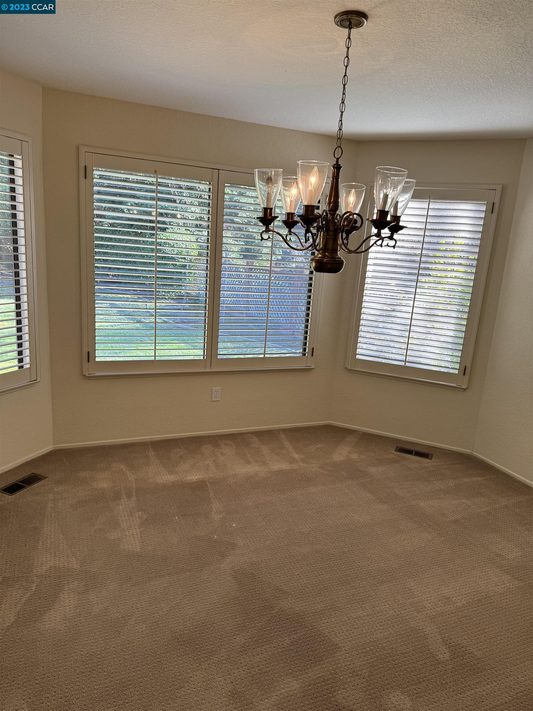 3089 Deer Meadow Drive Danville, CA 94506 - Photo 3 of 16 a view of a room window and chandelier