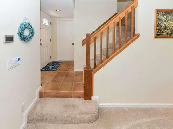 a view of room with window and entryway