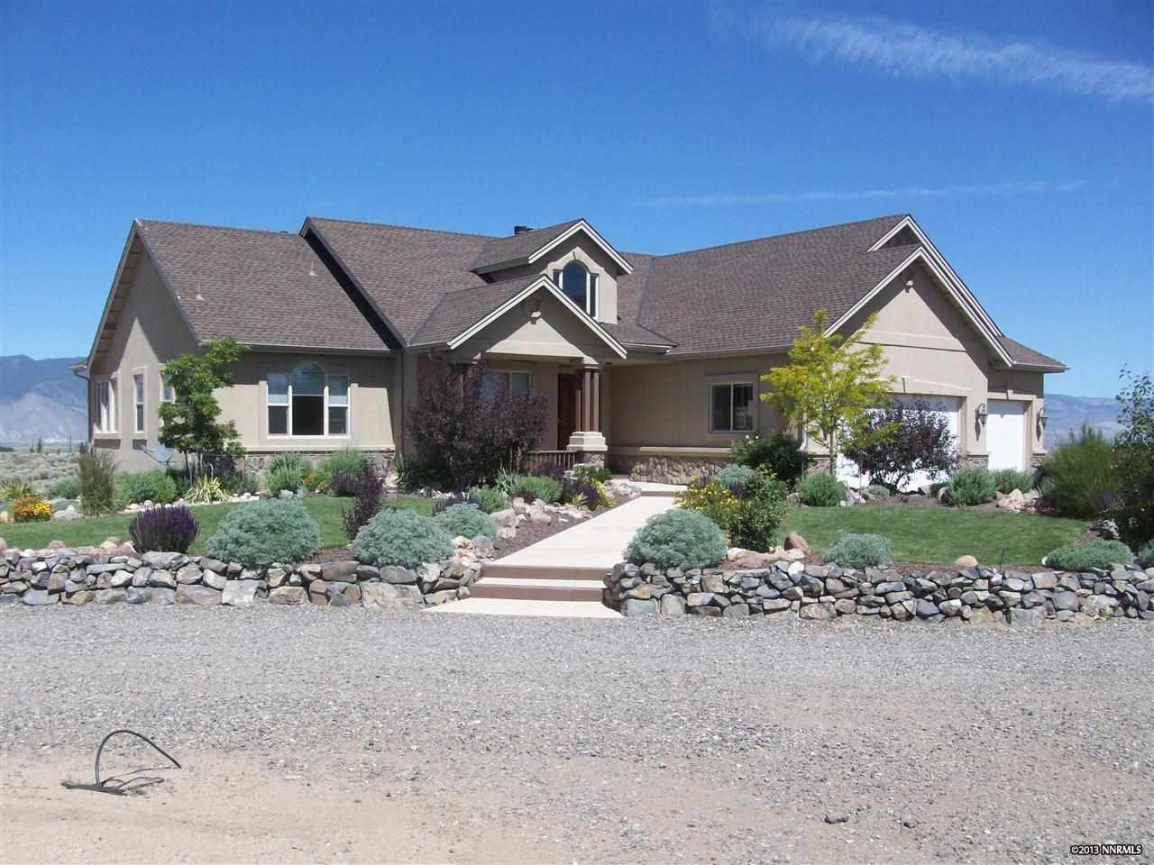 1709 Sawmill Road Gardnerville, NV 89410 - Photo 1 of 1 a front view of a house with a yard