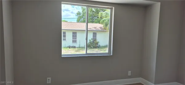 a view of a bathroom from a hallway