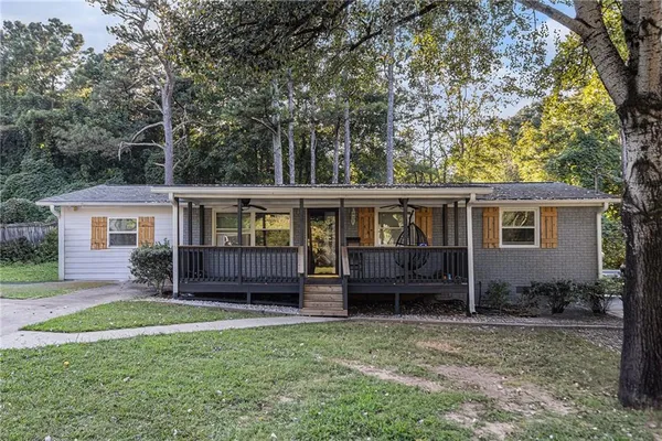 front view of a house with a yard