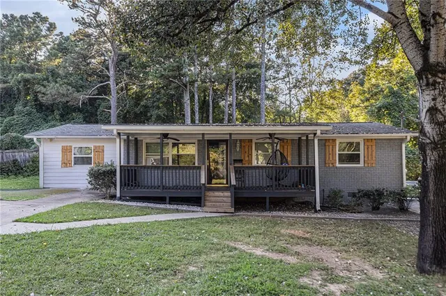 front view of a house with a yard