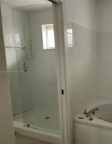 a bathroom with a bathtub