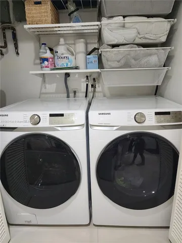 a utility room with dryer and washer