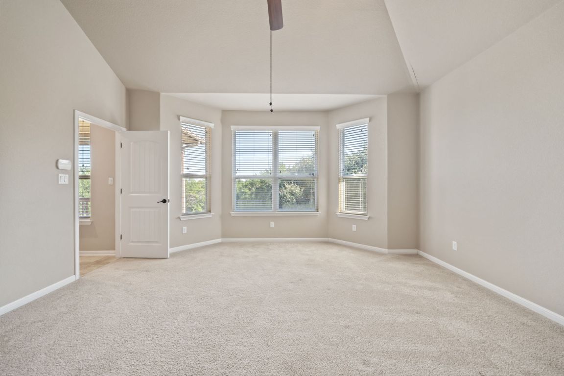 209 Rock Vista Run Austin, TX 78737 - Photo 28 of 40 a view of an empty room with a window