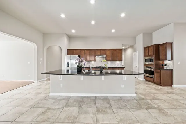 a bathroom with bathtub and shower
