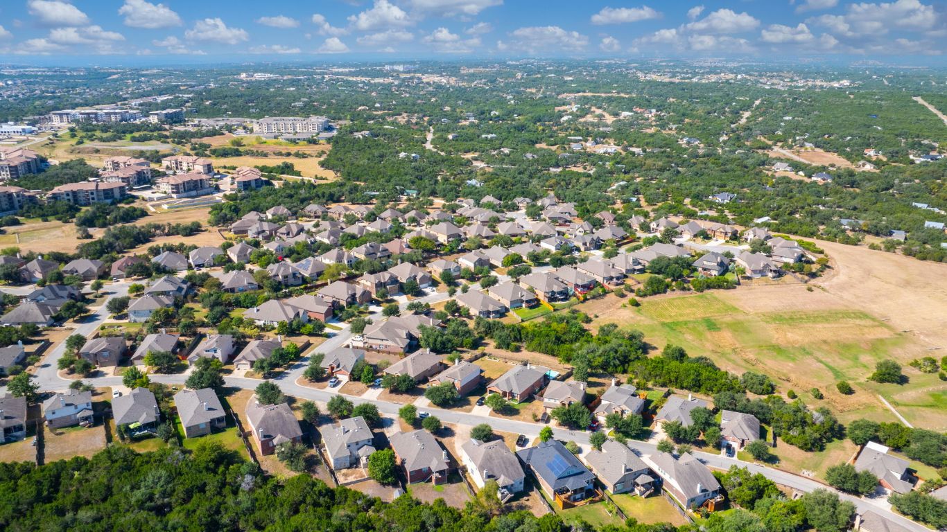 209 Rock Vista Run Austin, TX 78737 - Photo 40 of 40 an aerial view of residential houses with city view