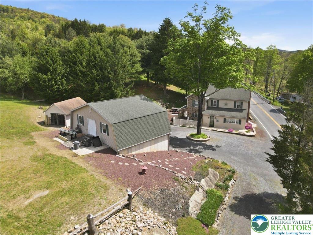4880 Little Gap Road Kunkletown, PA 18058 - Photo 86 of 100 This hillside residence offers a blend of natural beauty and functional outdoor spaces.