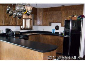 593 Rockfish Road Waynesboro, VA 22980 - Photo 4 of 23 a kitchen with a sink and cabinets