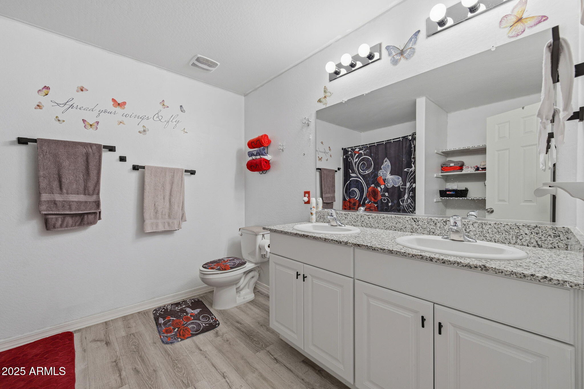 45433 West Sandhill Road Maricopa, AZ 85139 - Photo 18 of 32 a bathroom with a granite countertop sink and a mirror