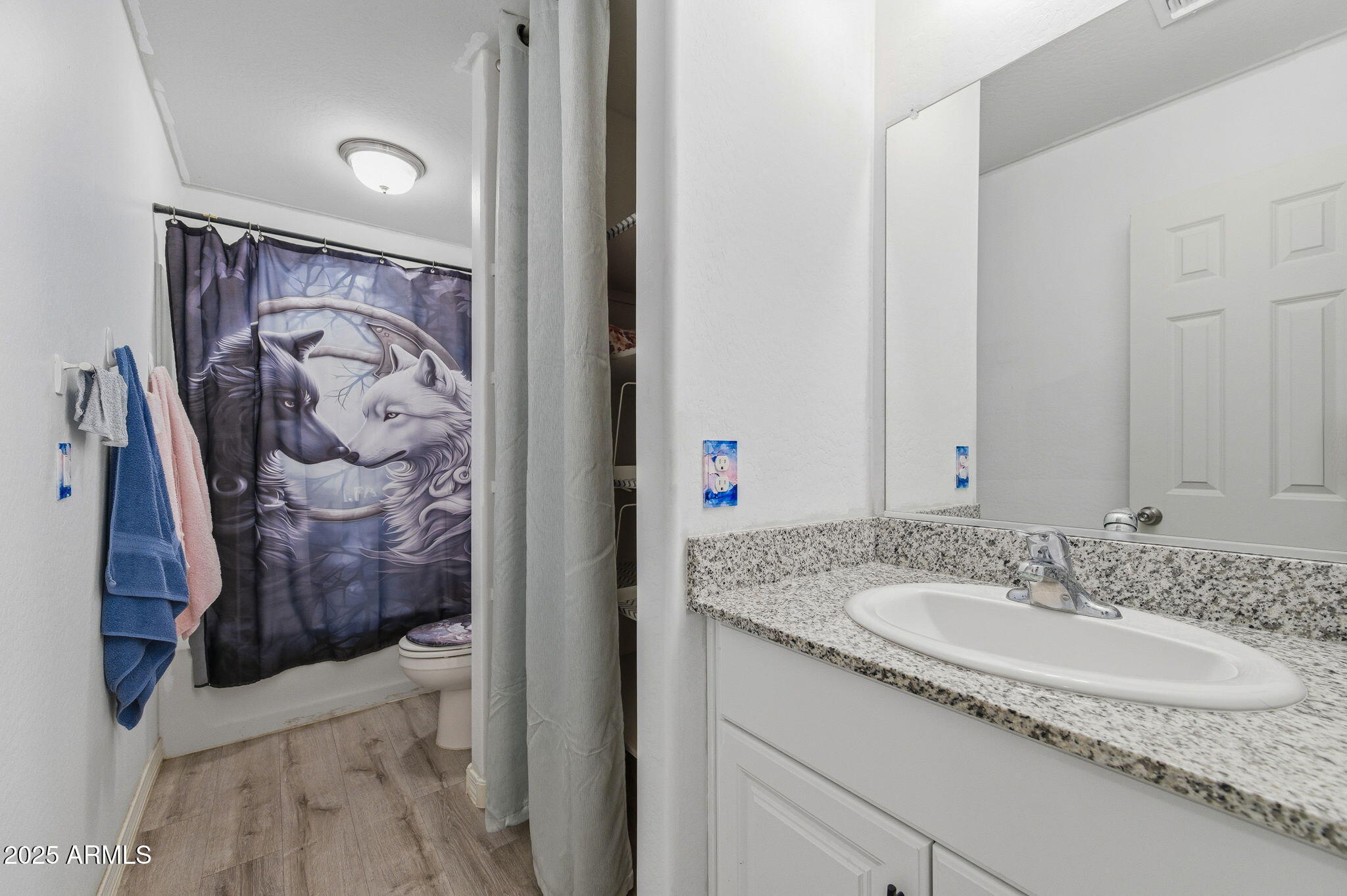 45433 West Sandhill Road Maricopa, AZ 85139 - Photo 21 of 32 a bathroom with a granite countertop sink and a mirror