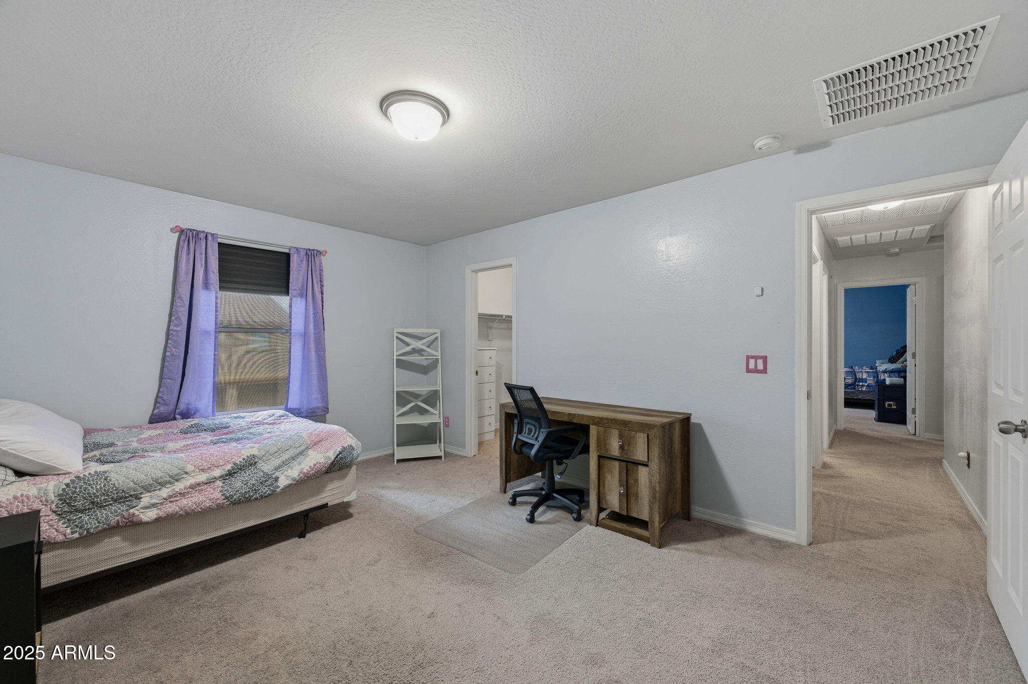 45433 West Sandhill Road Maricopa, AZ 85139 - Photo 23 of 32 a bedroom with bed and a large window