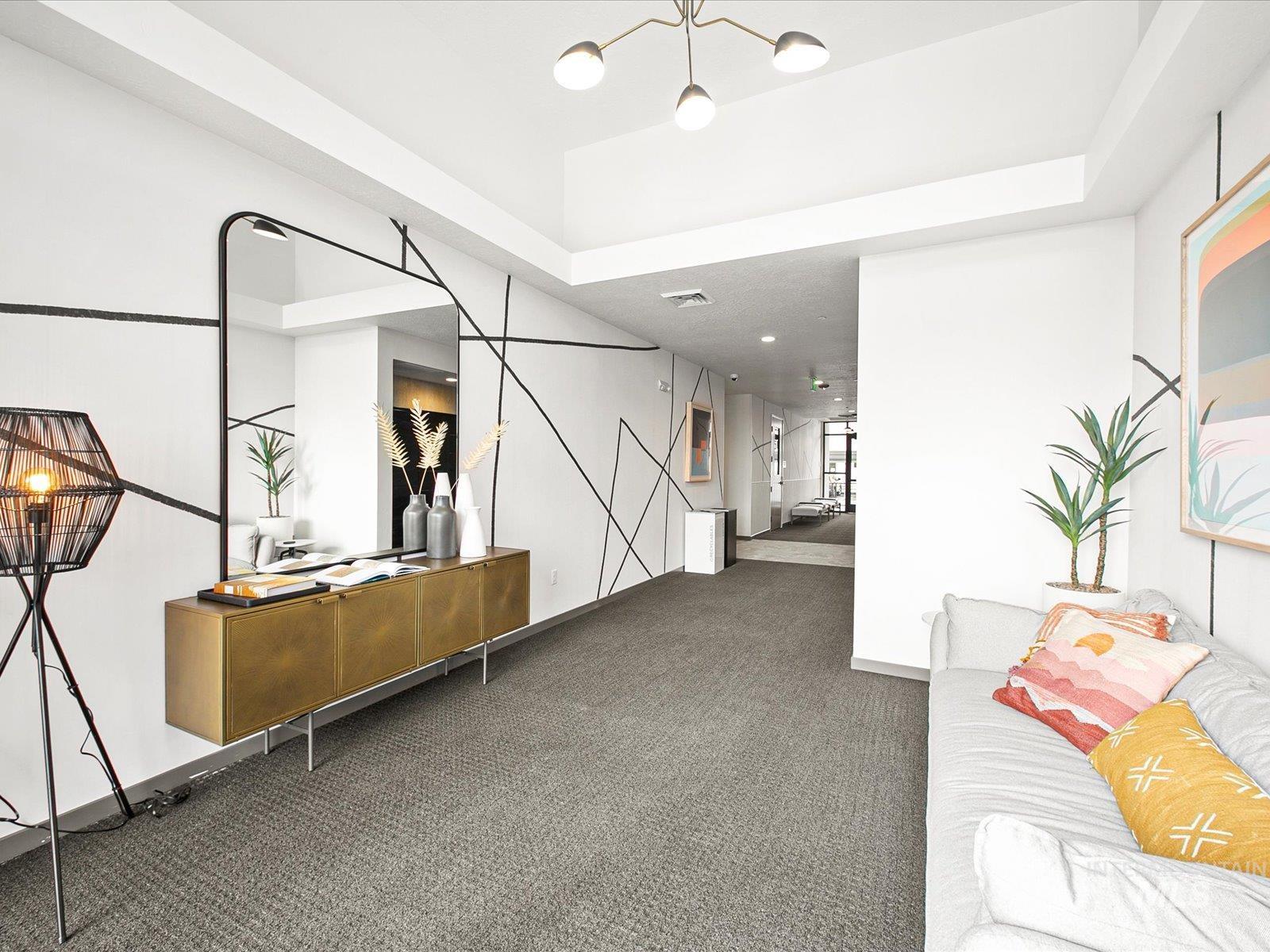 3850 East Haystack Street, Unit 302 Boise, ID 83716 - Photo 34 of 50 Unfurnished living room featuring carpet flooring