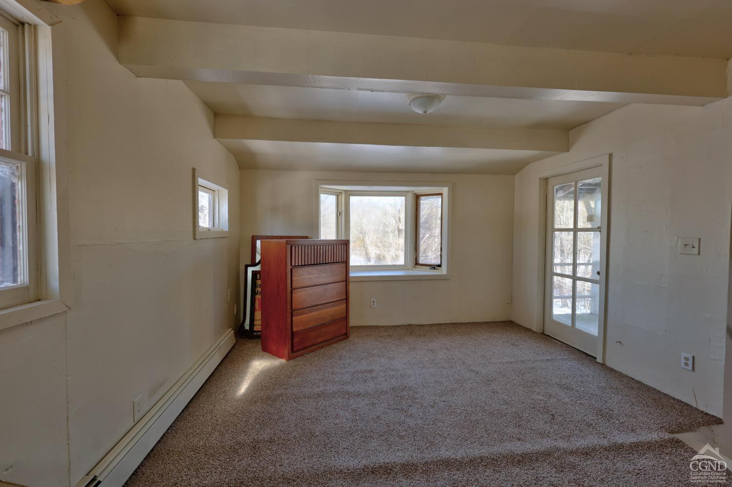 360 Stone Bridge Rd Extension East Durham, NY 12423 - Photo 39 of 83 an empty room with windows and closet