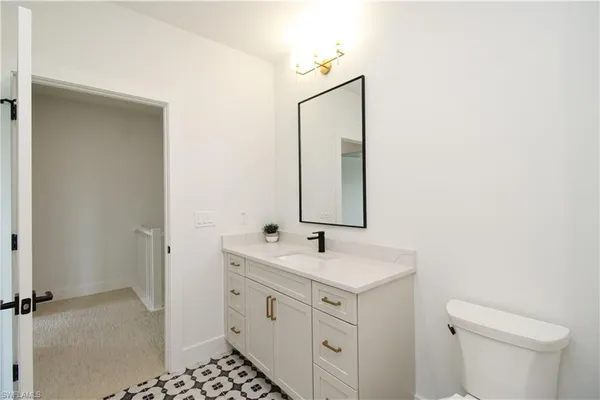 a bathroom with a sink a toilet and a bathtub