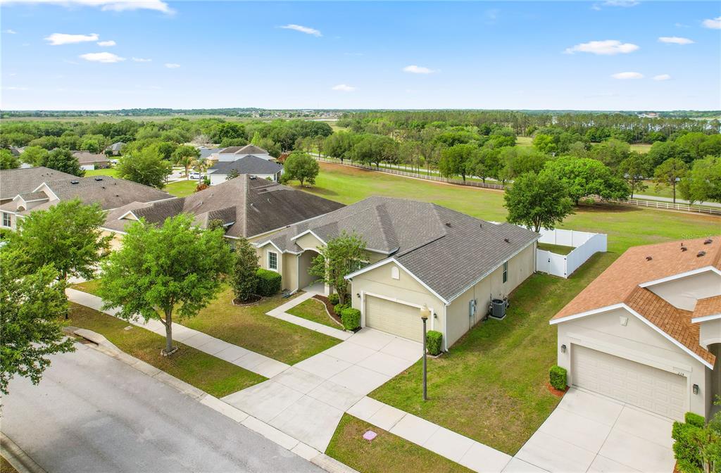 222 Blackstone Creek Road Groveland, FL 34736 - Photo 6 of 49 an aerial view of a house with big yard