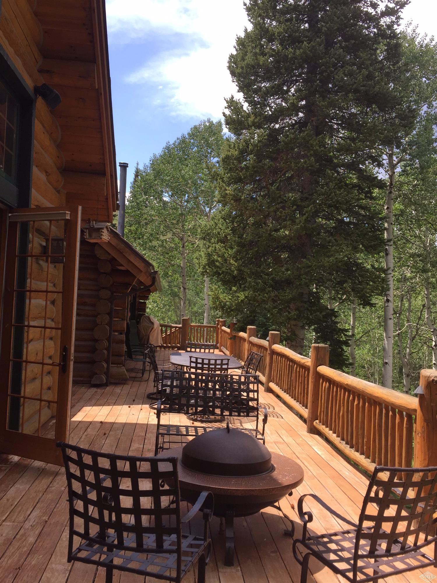4454 Bellyache Ridge Road Wolcott, CO 81655 - Photo 19 of 25 a view of balcony with wooden floor and outdoor seating
