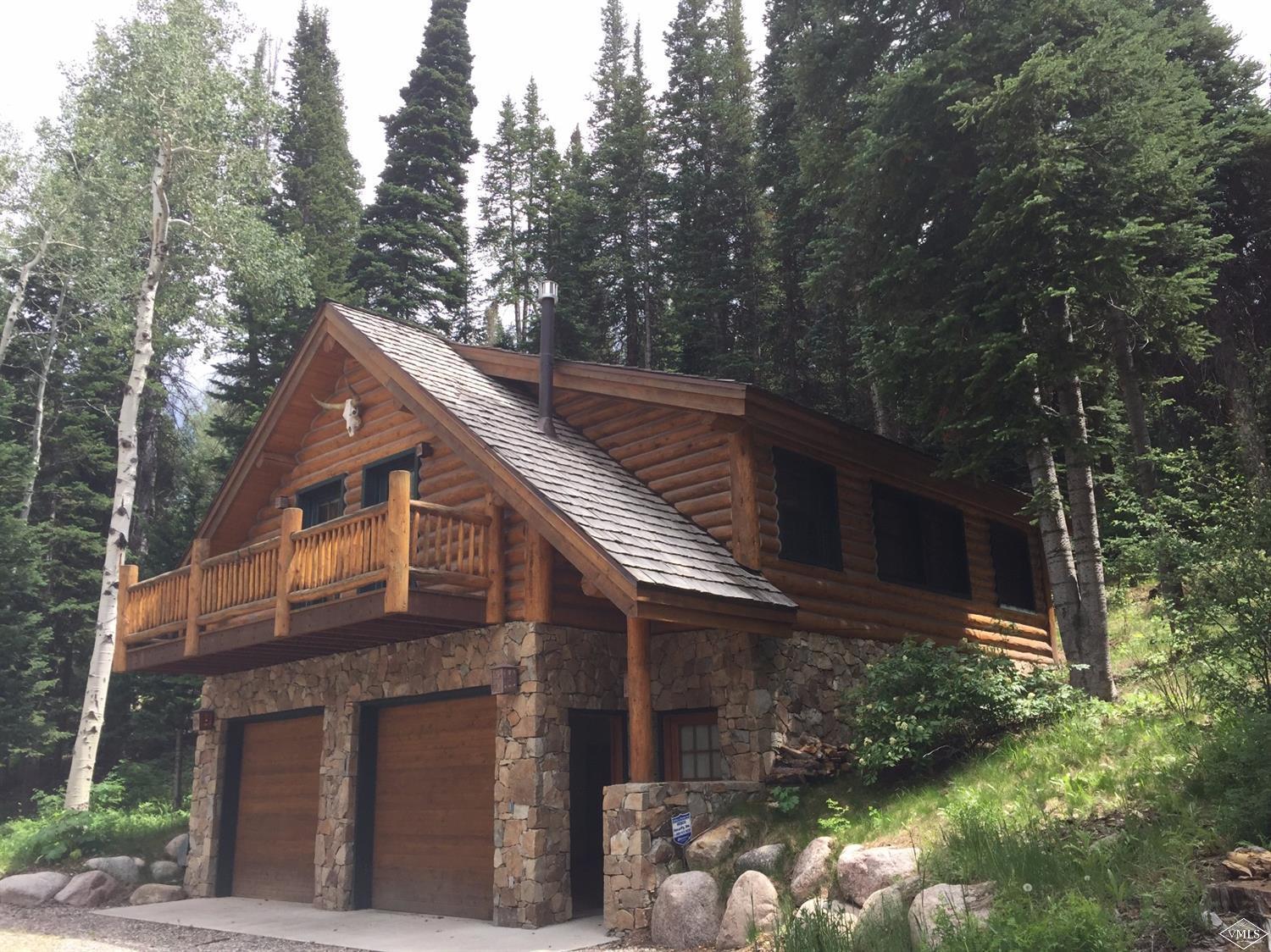 4454 Bellyache Ridge Road Wolcott, CO 81655 - Photo 23 of 25 a backyard of a house with lots of green space