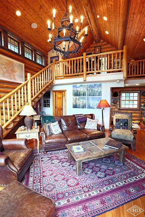 4454 Bellyache Ridge Road Wolcott, CO 81655 - Photo 4 of 25 a backyard of a house with barbeque oven table and chairs