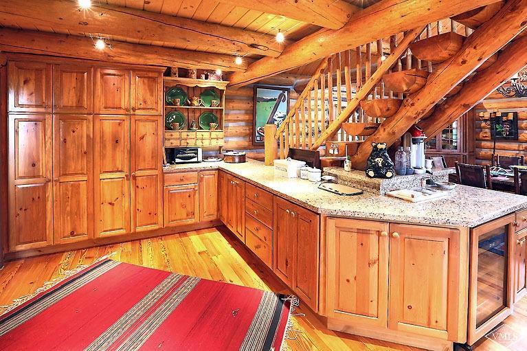 4454 Bellyache Ridge Road Wolcott, CO 81655 - Photo 6 of 25 a kitchen with stainless steel appliances granite countertop a sink and cabinets