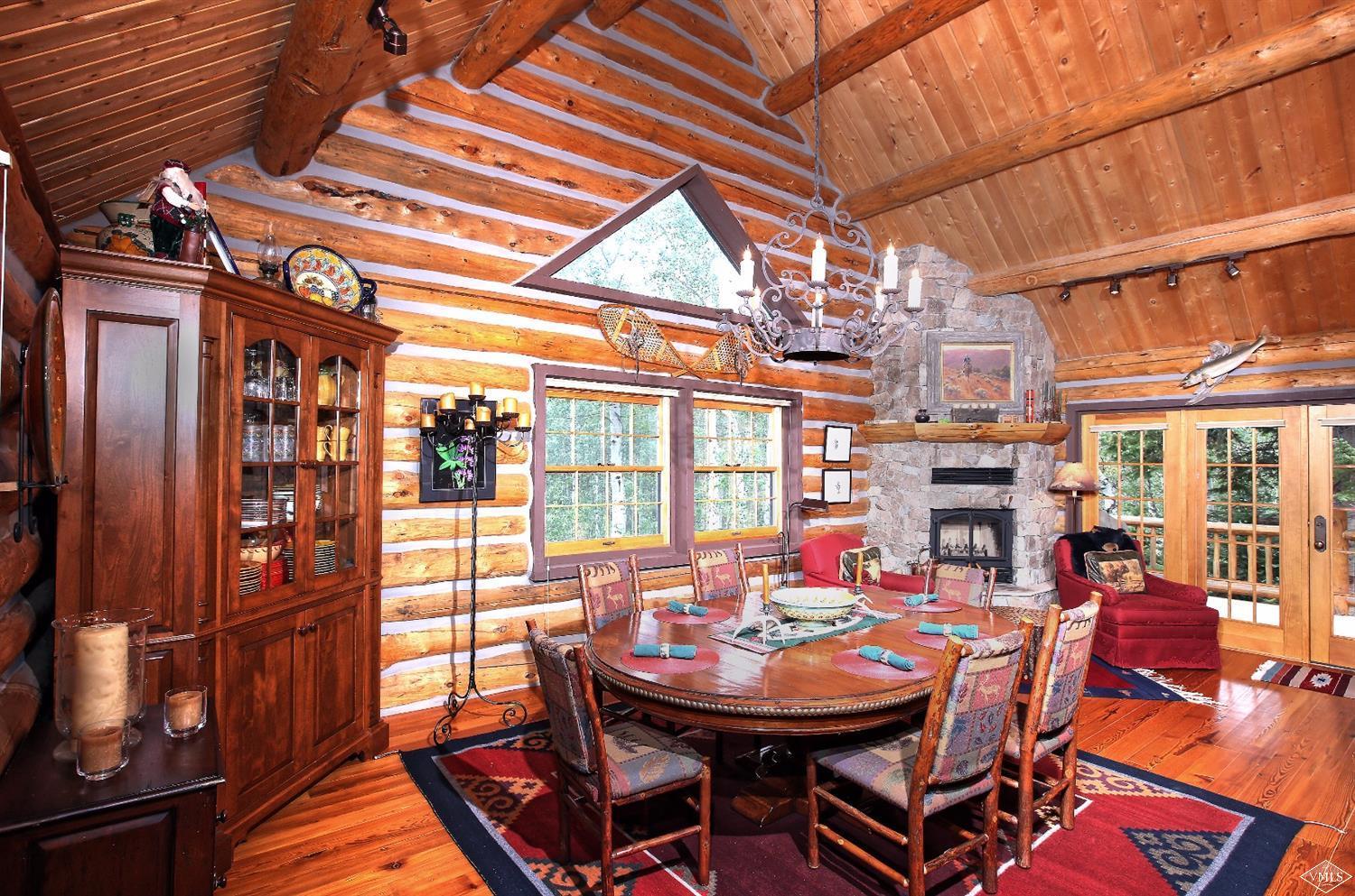4454 Bellyache Ridge Road Wolcott, CO 81655 - Photo 8 of 25 a view of a dining room with furniture window and outside view