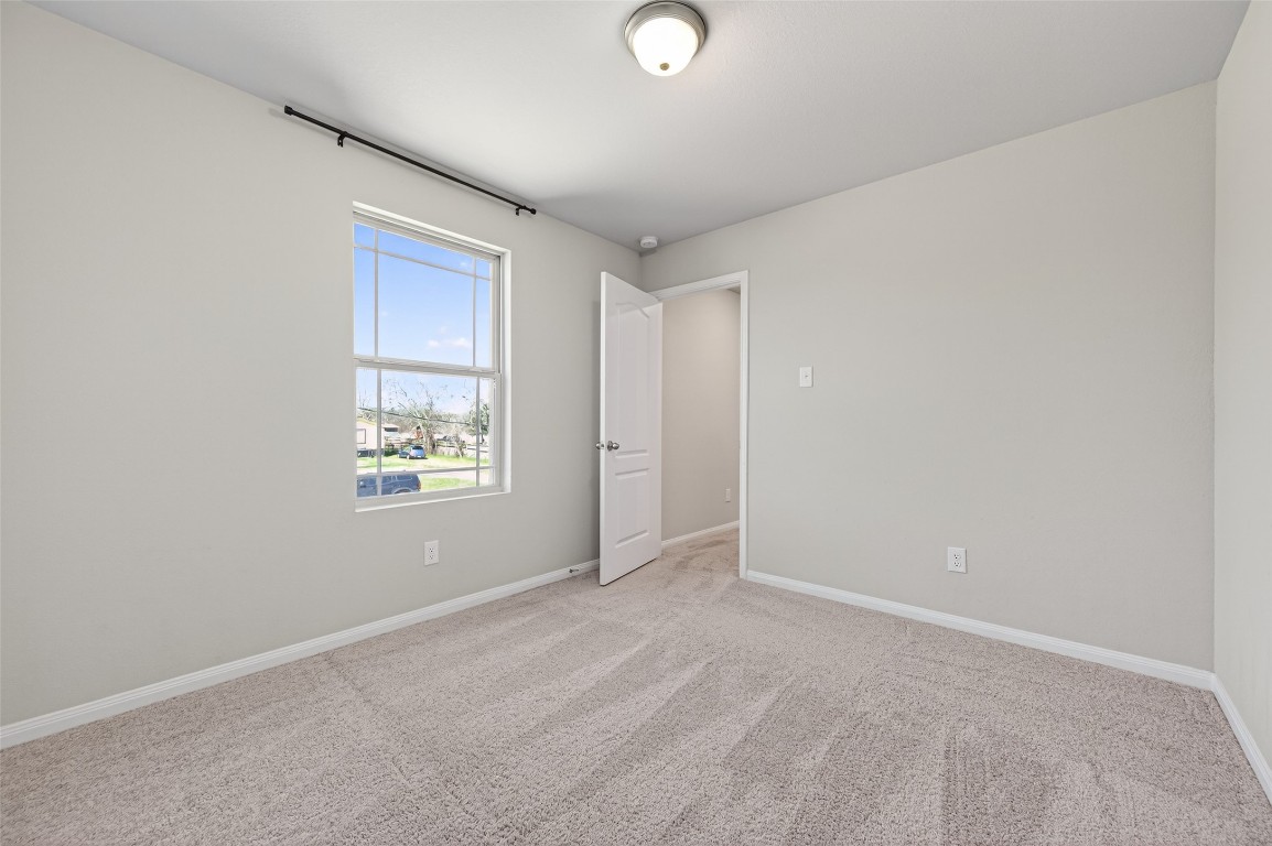 940 21st Street Hempstead, TX 77445 - Photo 25 of 36 an empty room with windows and closet
