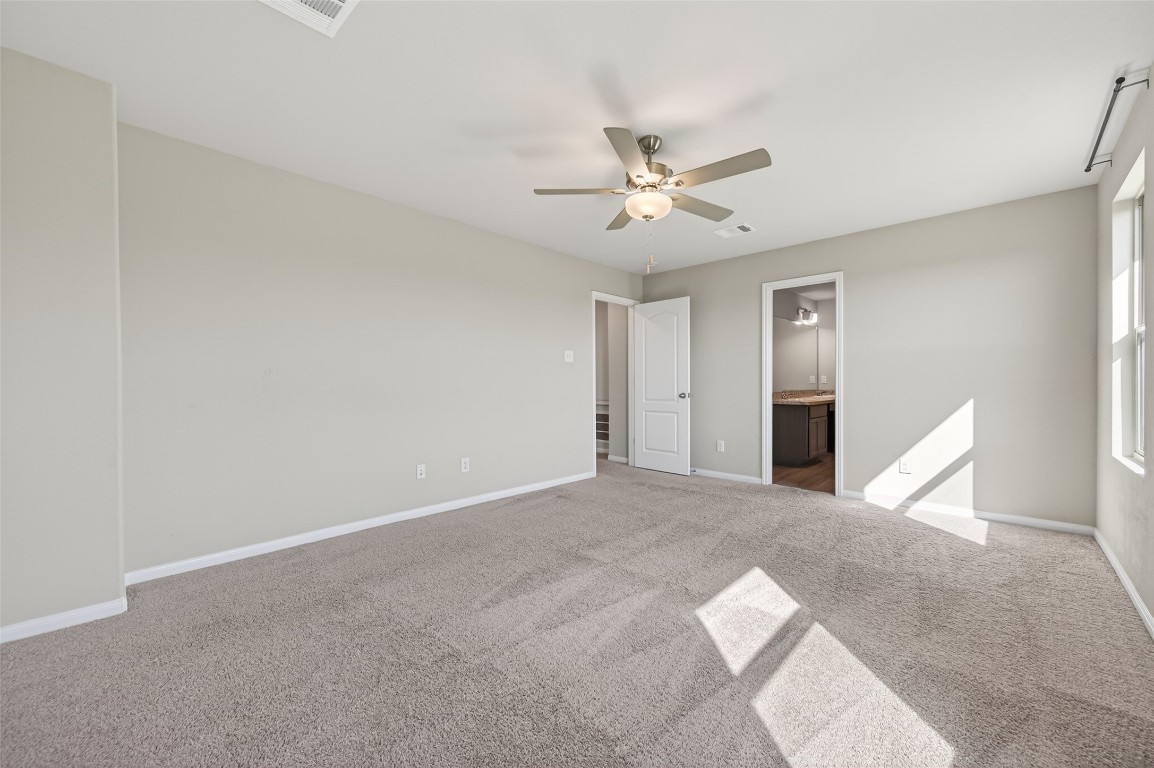 940 21st Street Hempstead, TX 77445 - Photo 28 of 36 a view of an empty room with chandelier fan