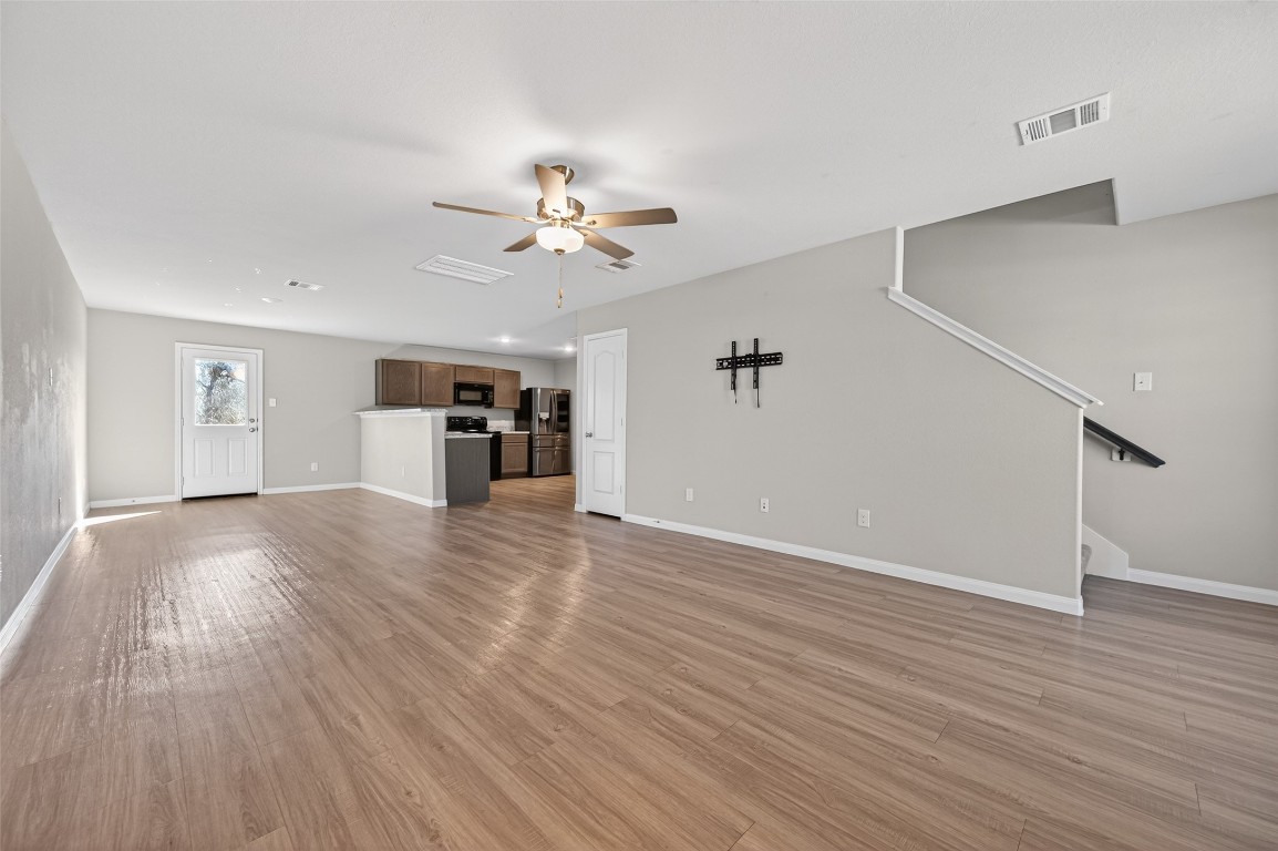 940 21st Street Hempstead, TX 77445 - Photo 3 of 36 a view of empty room with wooden floor