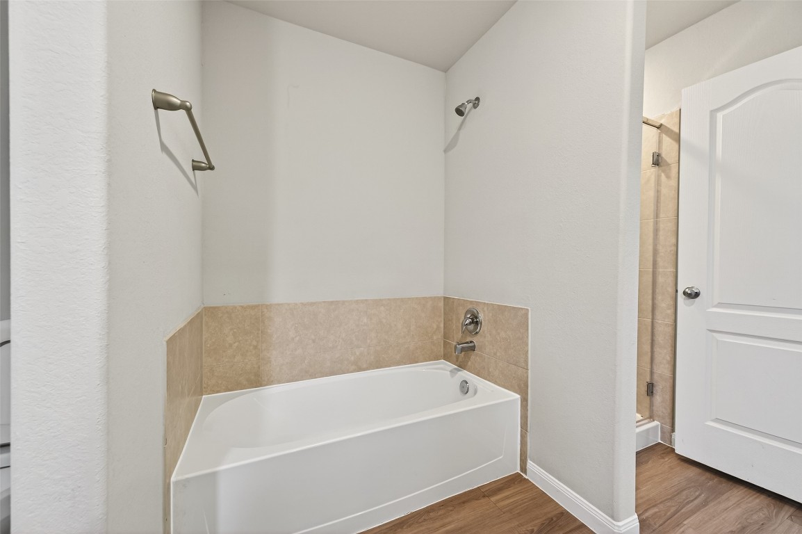 940 21st Street Hempstead, TX 77445 - Photo 32 of 36 a bathroom with a bathtub