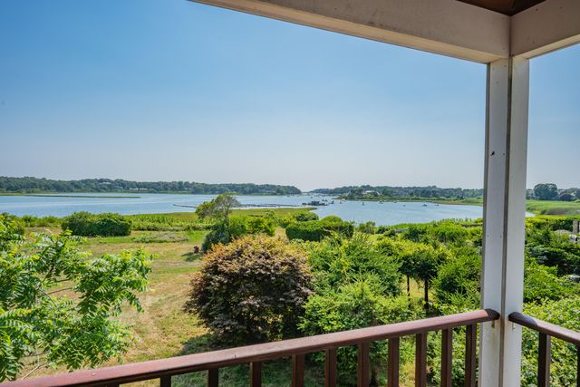 a view of a lake from a balcony