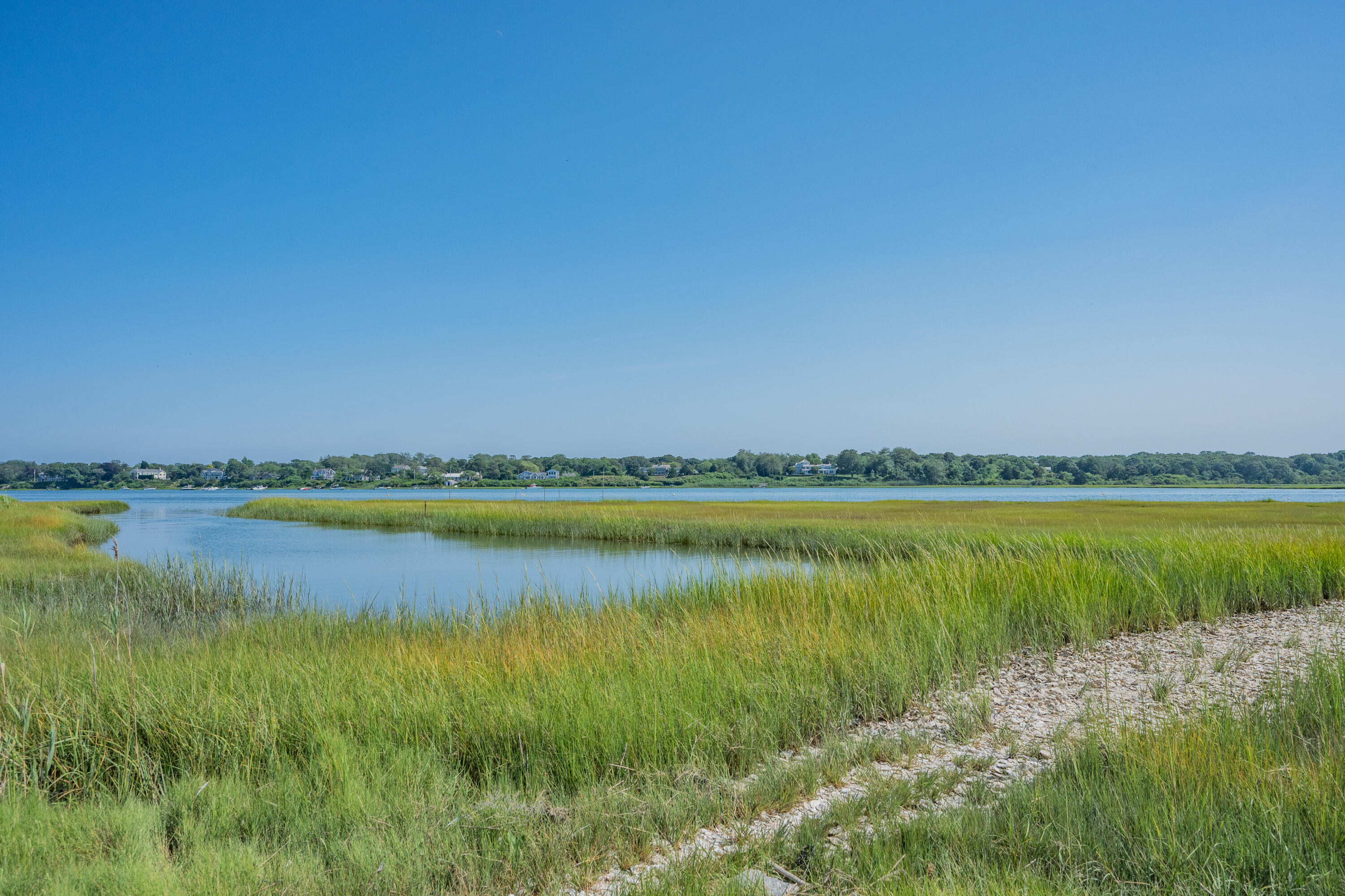 99 Uncle Alberts Drive Chatham, MA 02633 - Photo 17 of 32 a view of a lake and a mountain view